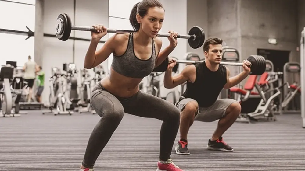 Bảng giá thuê PT tập gym theo buổi chi tiết và các yếu tố ảnh hưởng