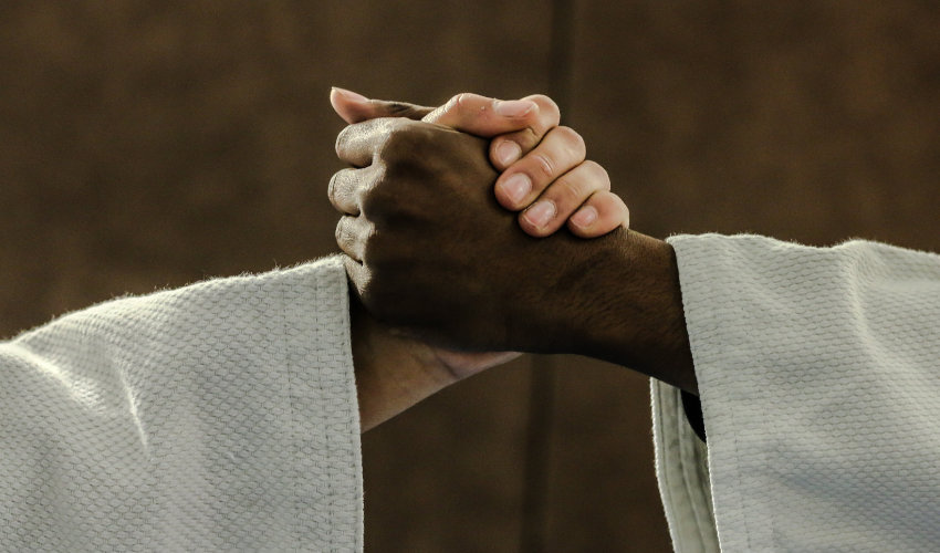 Huấn luyện viên Judo giảng dạy về triết lý Seiryoku Zenyo và Jita Kyoei