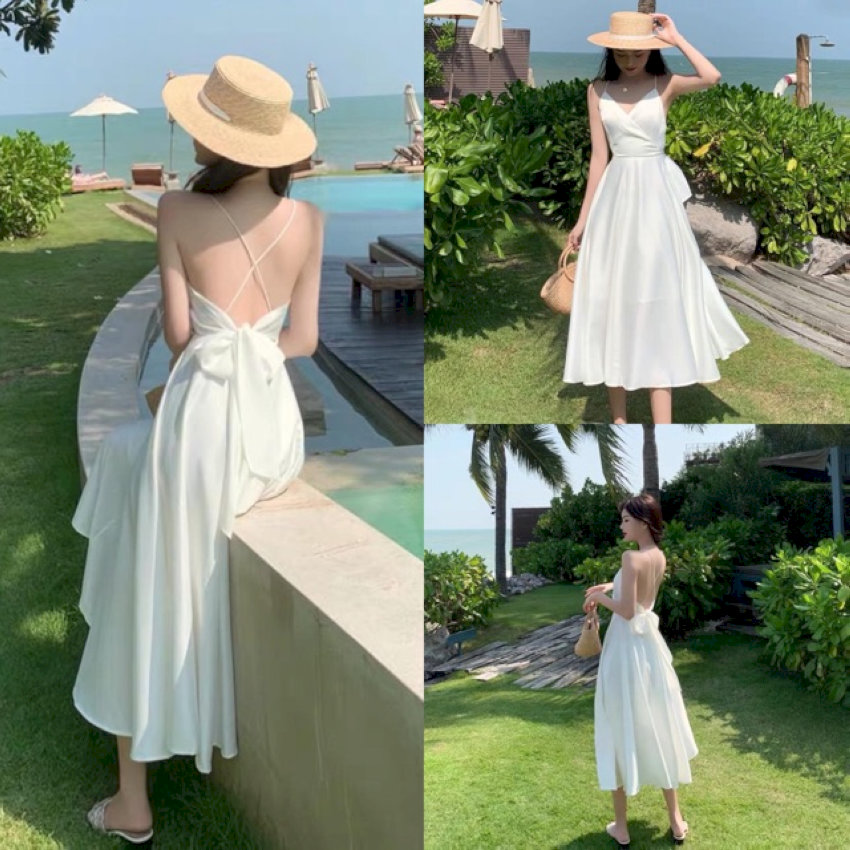 Váy maxi họa tiết là outfit đi biển đẹp