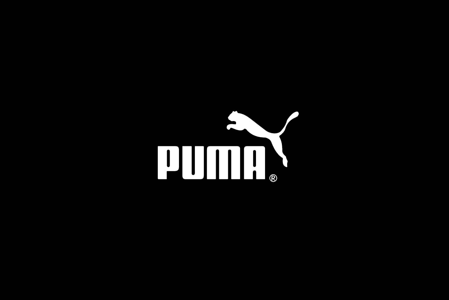 Puma với logo báo nhảy vọt thể hiện tốc độ và sức mạnh