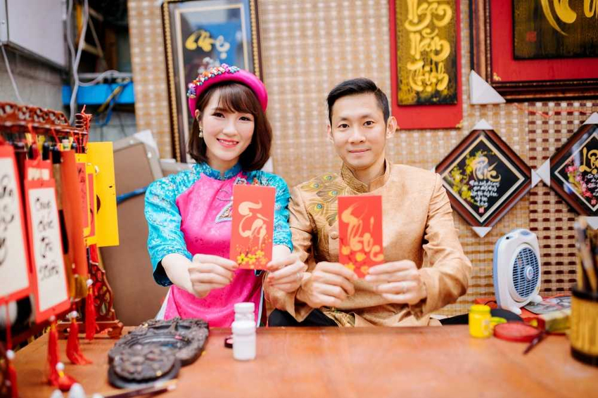 Vũ Thị Trang cùng Nguyễn Tiến Minh trên sân cầu lông