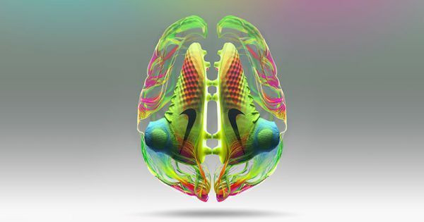 Giày bóng đá Nike Magista màu vàng nổi bật trên sân cỏ