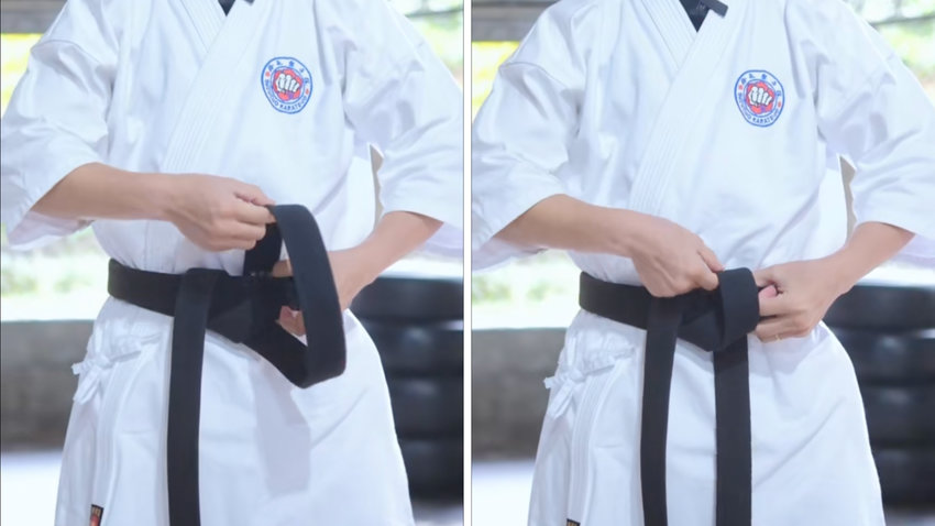 Võ sinh tạo nút khóa đầu tiên bằng phần dây đai Karate dài hơn, bước then chốt để thắt đai chặt hơn.