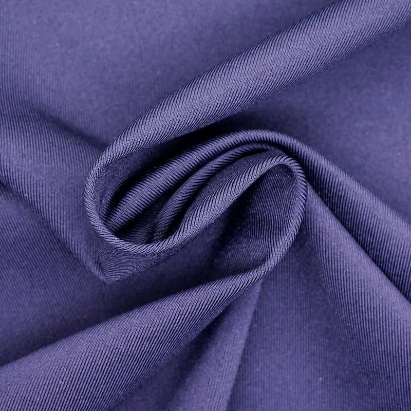 Vải Lycra được lựa chọn để may áo bóng chuyền Nhật Bản, tăng cường độ co giãn và thoải mái tối đa