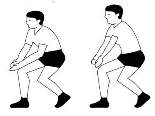 Vận động viên bóng chuyền ở tư thế chuẩn bị cho kỹ thuật đập bóng chuyền